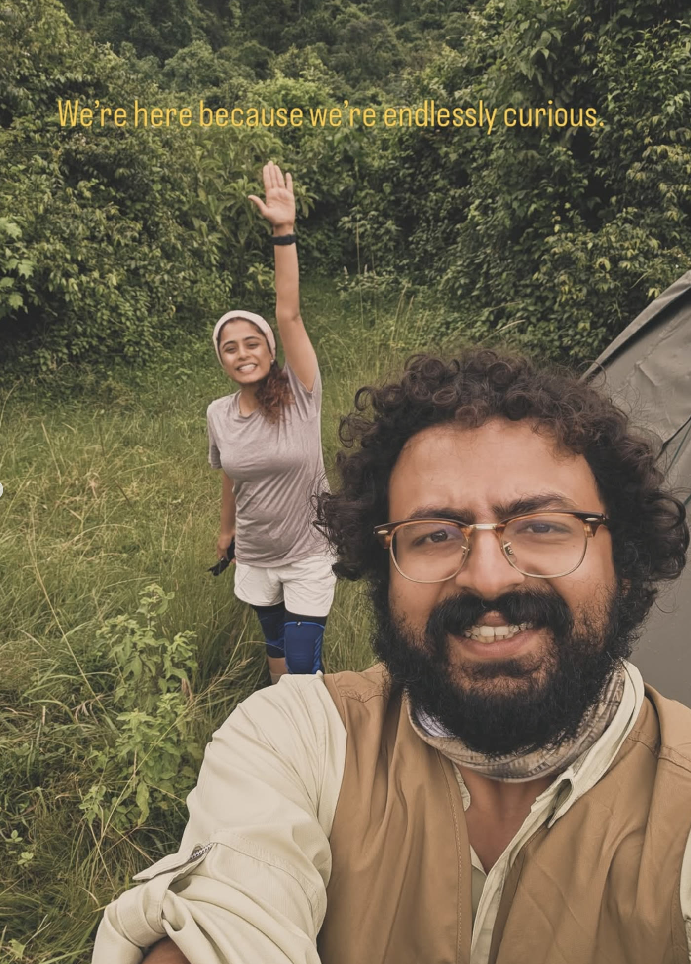 Vishal and Manasa exploring a green landscape