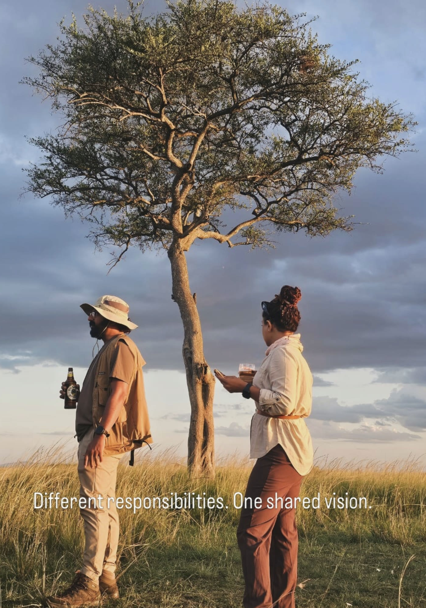 Vishal and Manasa standing beneath a tree